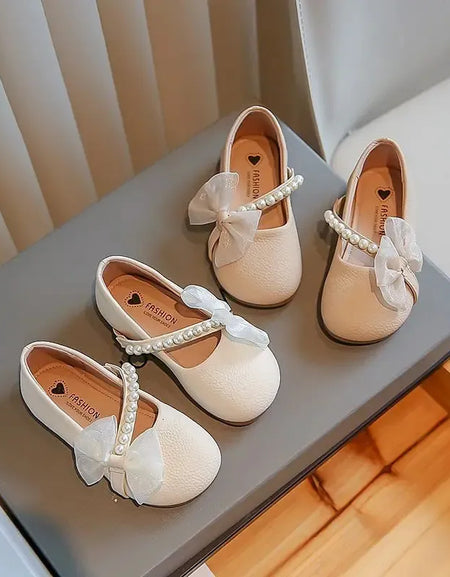 Bowknot Slanted Pearl Strap Girls' Flat Shoe.