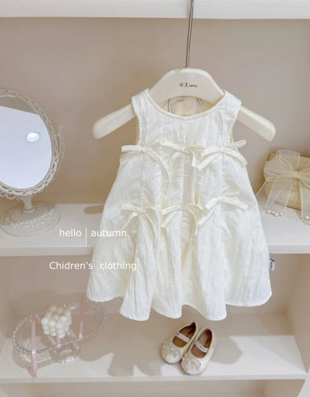 The Mia Bow Detailed Dress