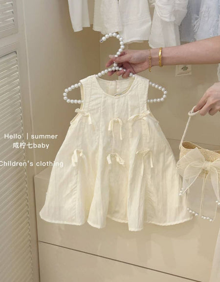 The Mia Bow Detailed Dress