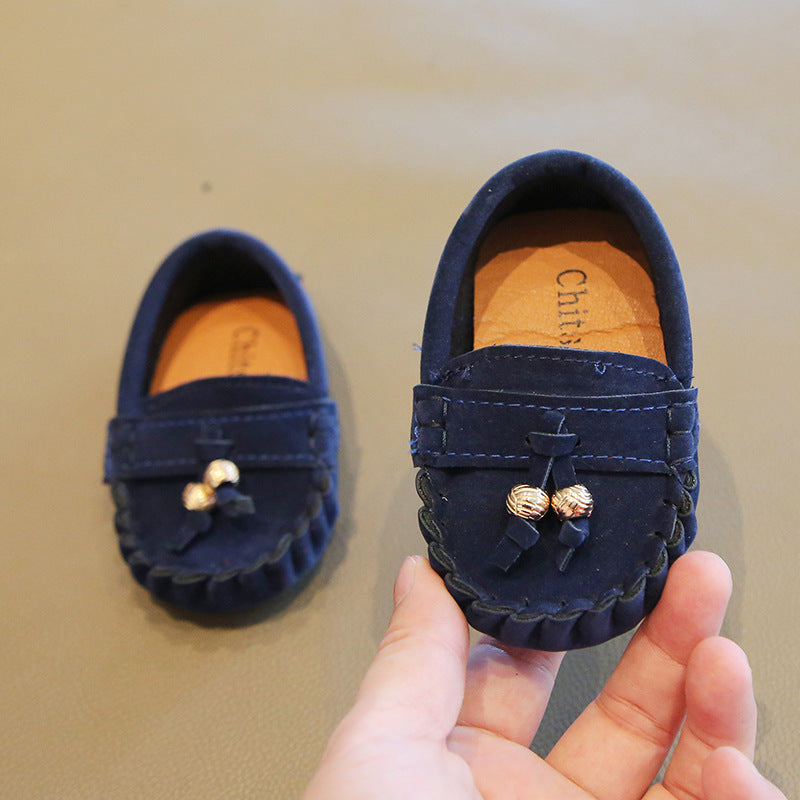 Chic Metallic Tassel Moccasins