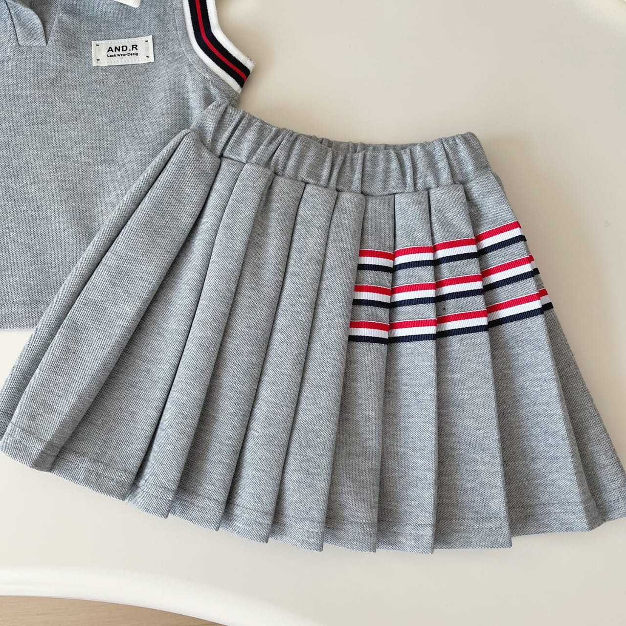 Classic Varsity Sleeveless Polo & Pleated Skirt Set