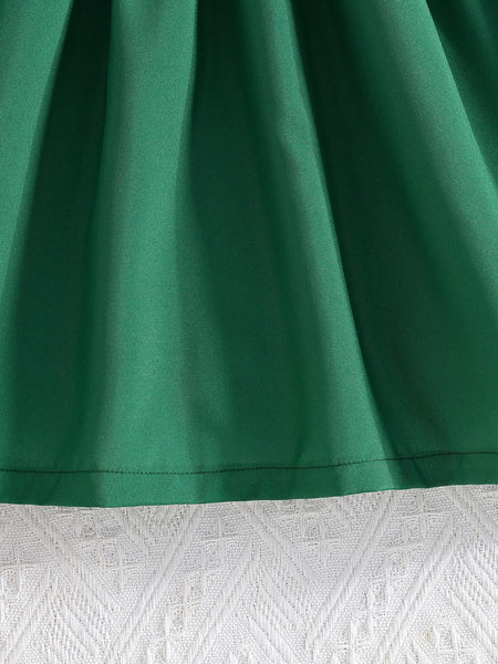 The Emerald Elegance Ruffled Party Dress