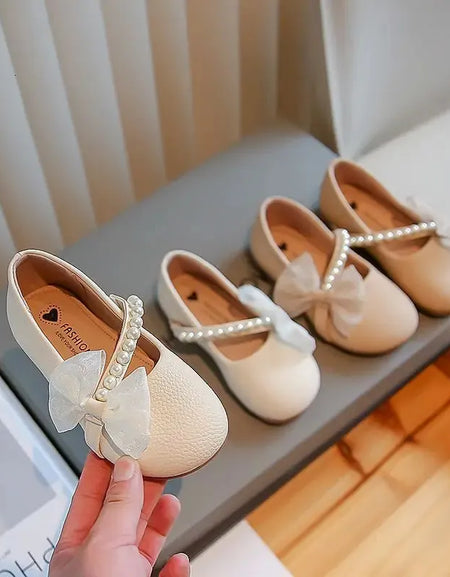 Bowknot Slanted Pearl Strap Girls' Flat Shoe.